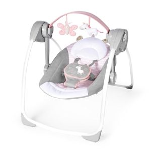 Ingenuity, Columpio Compacto y Plegable Flora el Unicornio, 6 velocidades de balanceo, temporizador, 12 melodías, arco de juegos extraíble, rosa, desde recién nacido hasta los 9 kg, 1 Unidad
